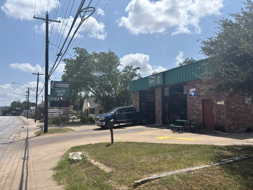 The Little Shop on Lamar Keeping Your Registration in Check lube pitstop garage bay